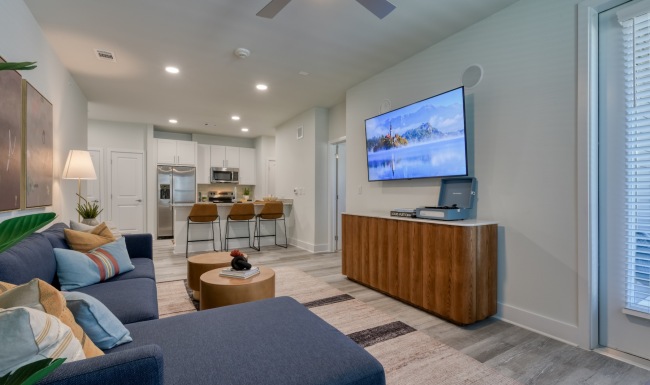 a living room with a couch and a tv