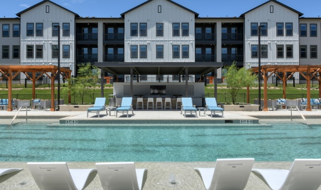 a swimming pool with chairs